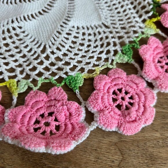 Hand made crochet doily with pink flowers. - Picture 2 of 4